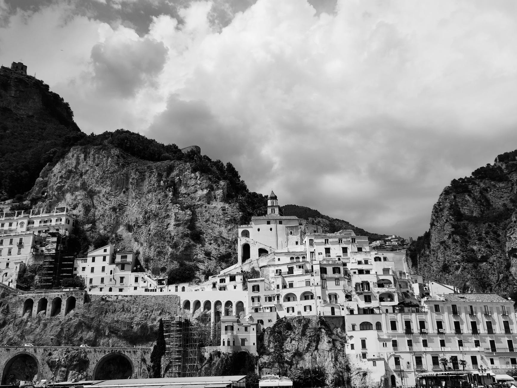 grayscale photo of positano