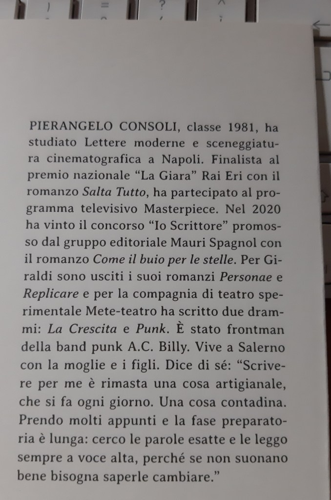 Camera angle close-up of a text page featuring biographical information about Pierangelo Consoli, a contemporary Italian author and screenwriter.
