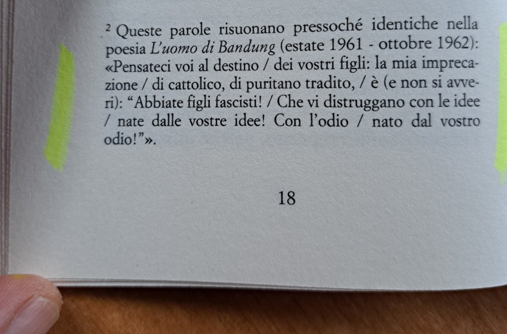 A close-up of an open book page featuring text in Italian, with highlighted segments and a hand holding the page.